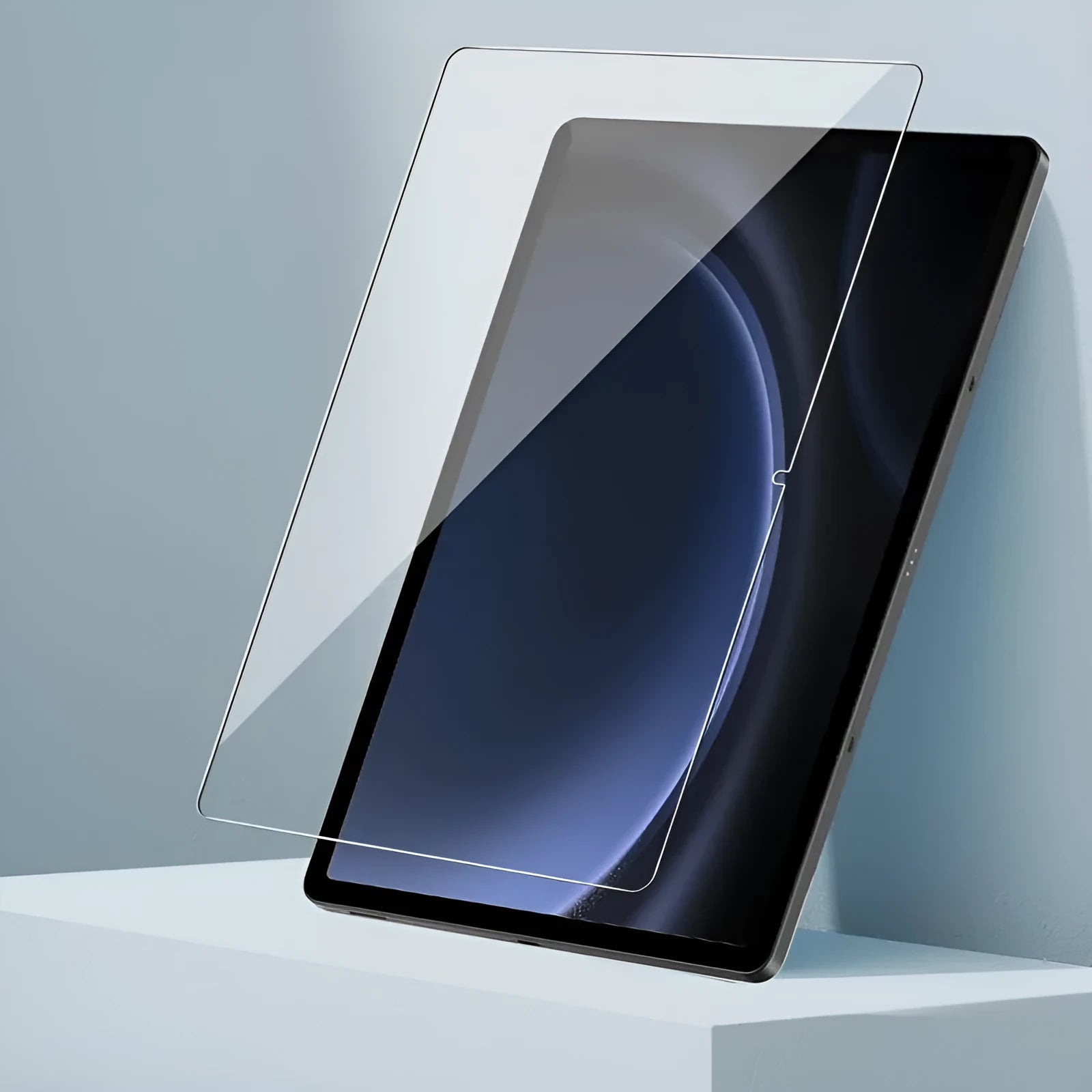 Samsung Galaxy tablet with a clear tempered glass screen protector showing anti-fingerprint and full coverage features.