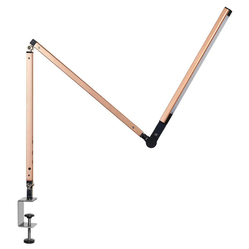 Aluminium clip-on desk lamp with a folding arm and remote control, shown in dazzling black finish.