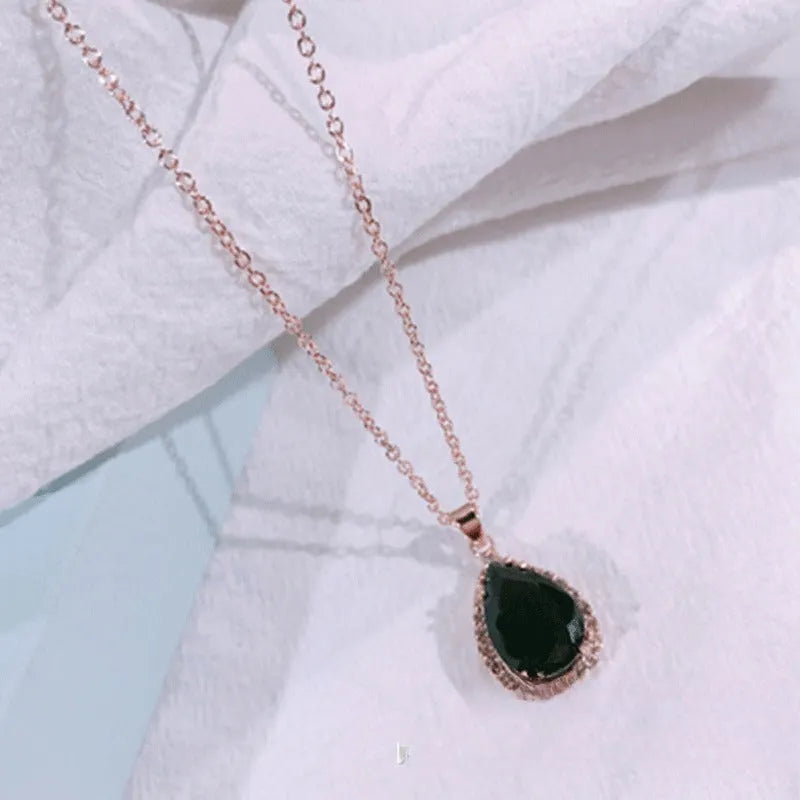Women's rose gold rhinestone drop shape necklace with geometric design and alloy construction