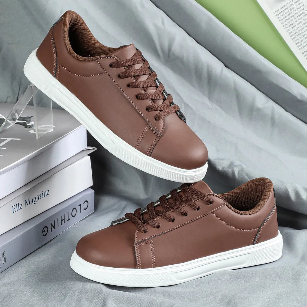 Beige brown platform skateboard sneakers with cross belt design and rubber sole
