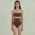Brown women's triangle one-piece swimsuit made from nylon fabric.