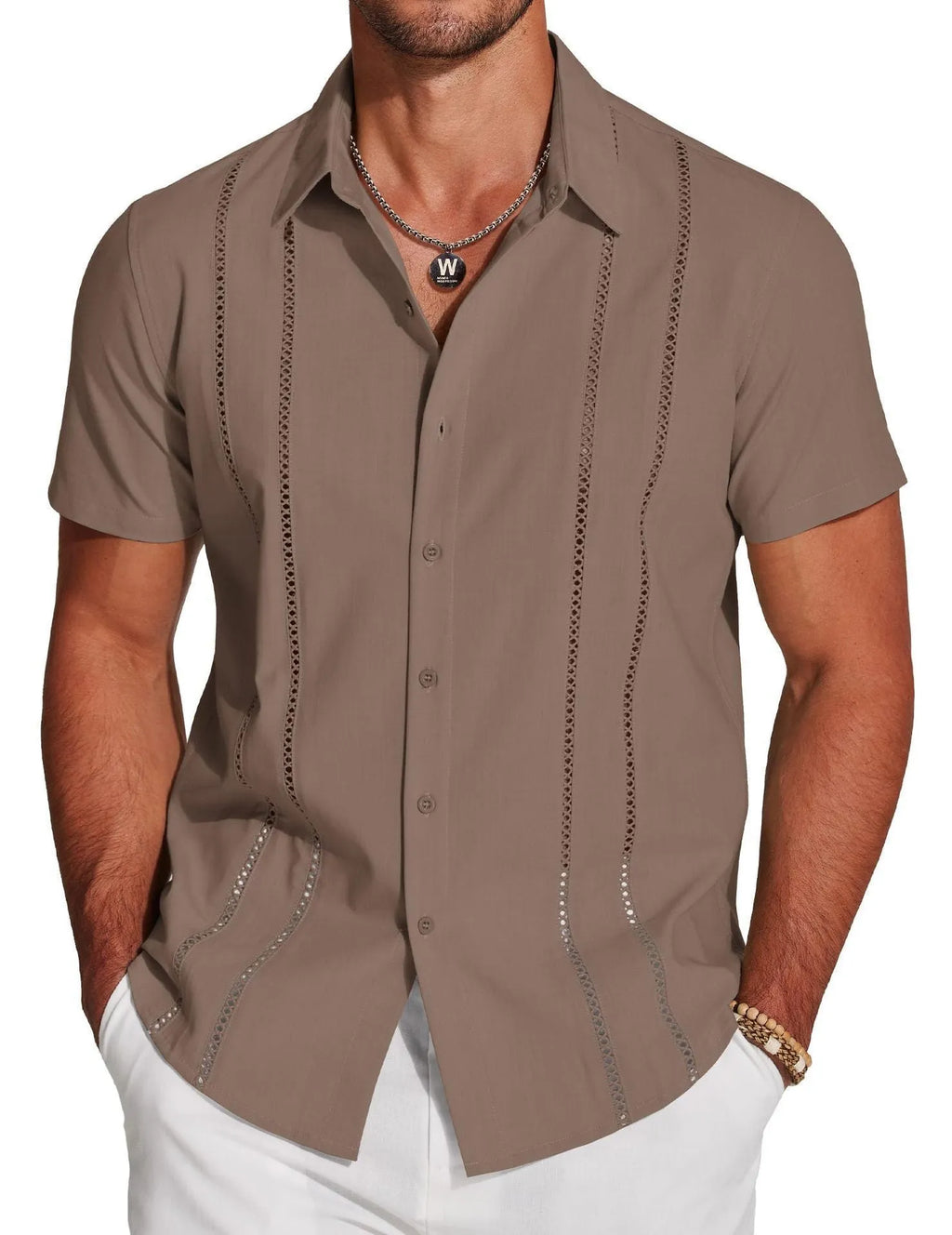 Man wearing a slim fit, short sleeve Hawaiian shirt with a digital printed pattern in a casual setting.