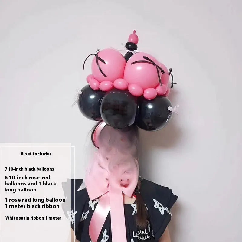 Round shaped balloon bouquet cake decoration DIY kit with colourful balloons arranged as party centrepiece