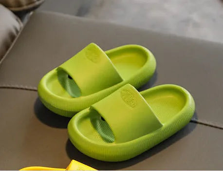 Children's EVA slippers in bright colours with non-slip soles, showing size options from 15.5cm to 21.5cm