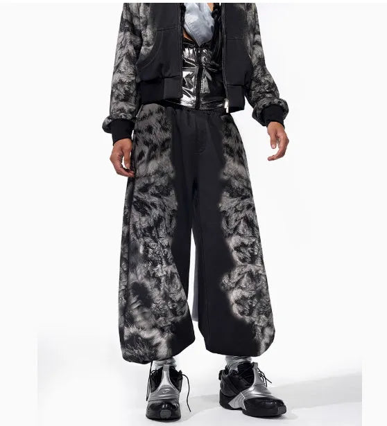 Streetwear three-piece set showing hoodie, seven-inch shorts and loose fit trousers with printed collage detail