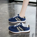 Blue women's casual sports shoes with cross shoulder straps and flat rubber sole