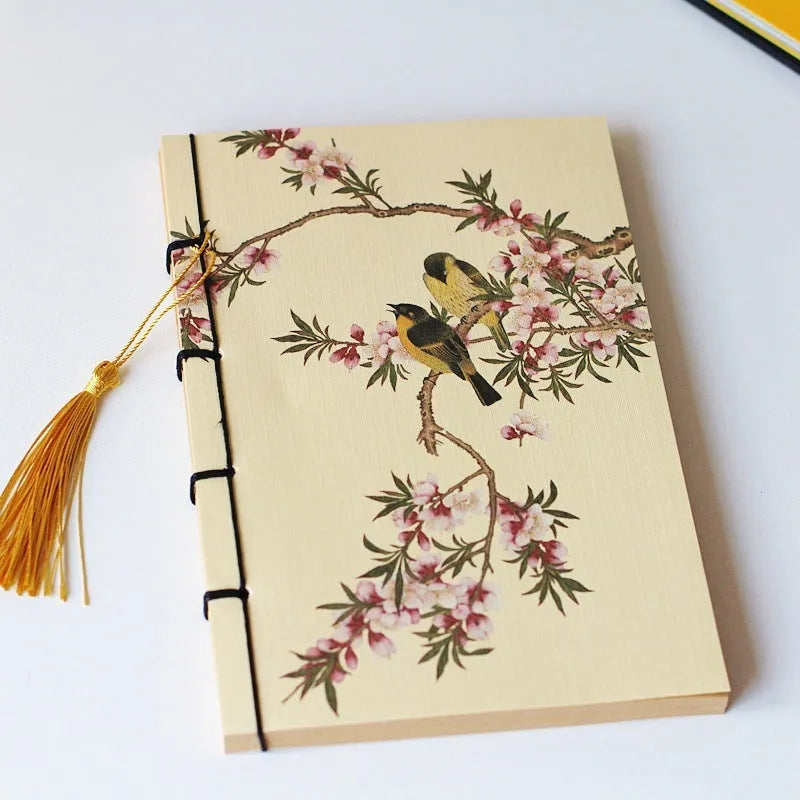 Retro antique wire-bound ledger notebook with embossed cowhide cover and decorative tassels