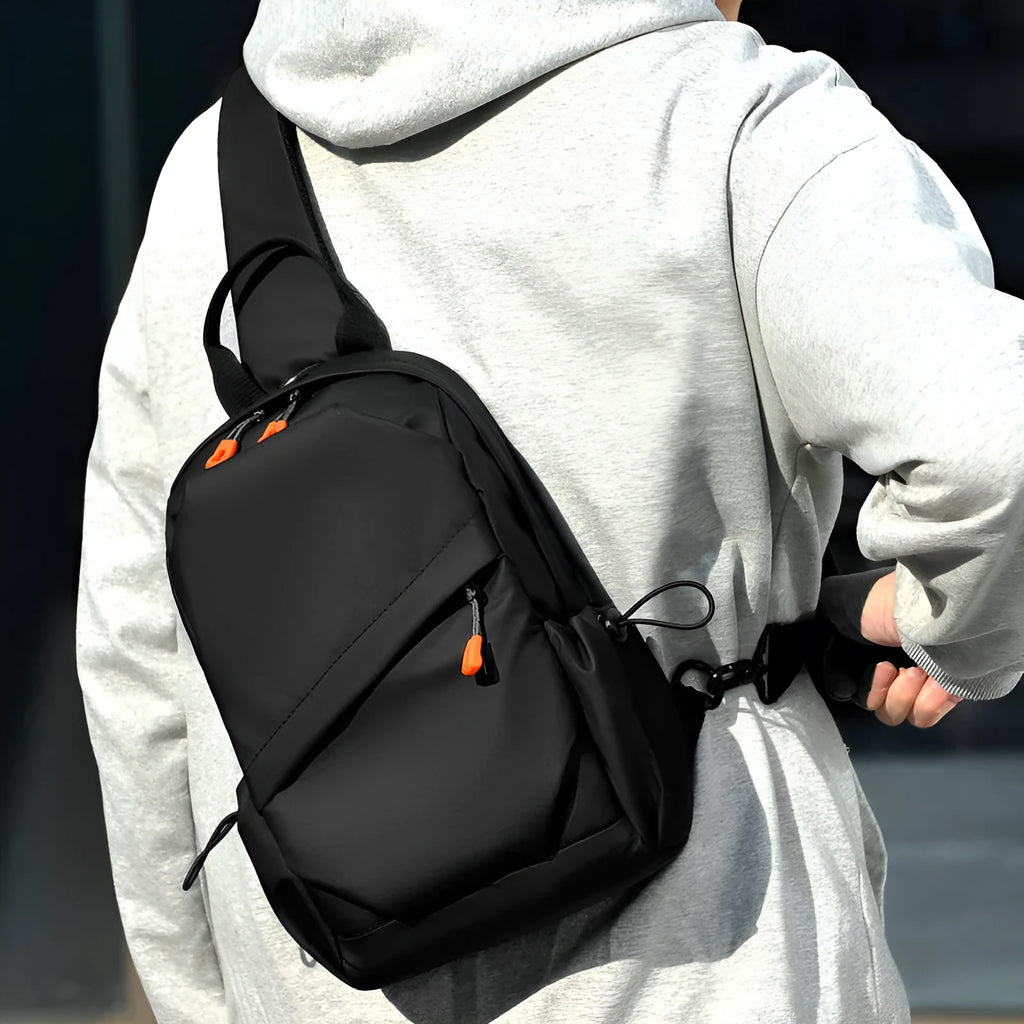 Men's black polyester crossbody bag with waterproof coating and shoulder strap