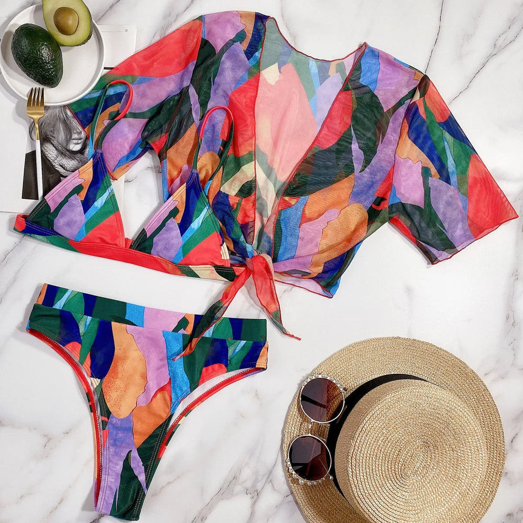 Red women's split swimsuit in nylon fabric for swimming and surfing.