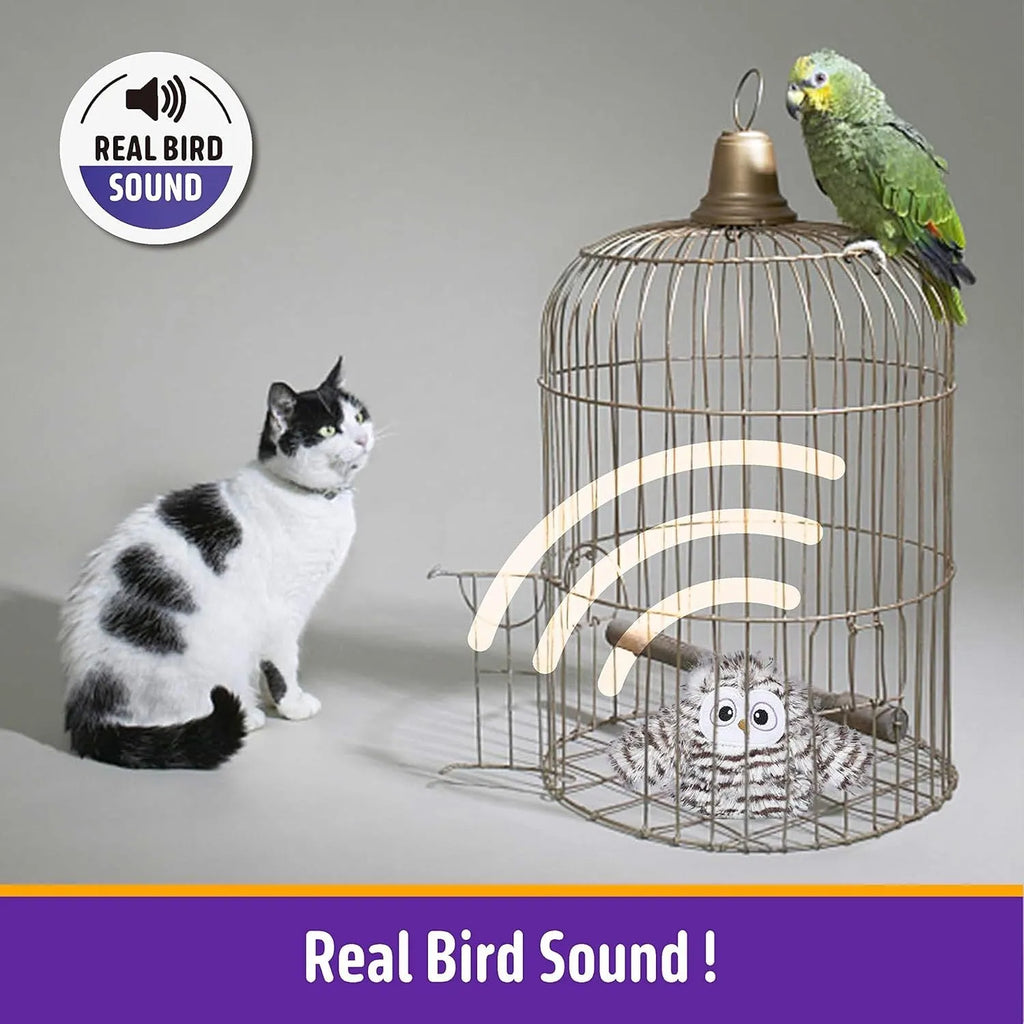 Grey rechargeable electronic owl cat toy with flapping wings on a floor.