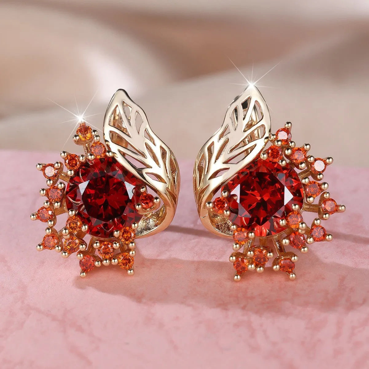 Round floral earrings with feather zircon arrangement in champagne gold with six diamond colour options