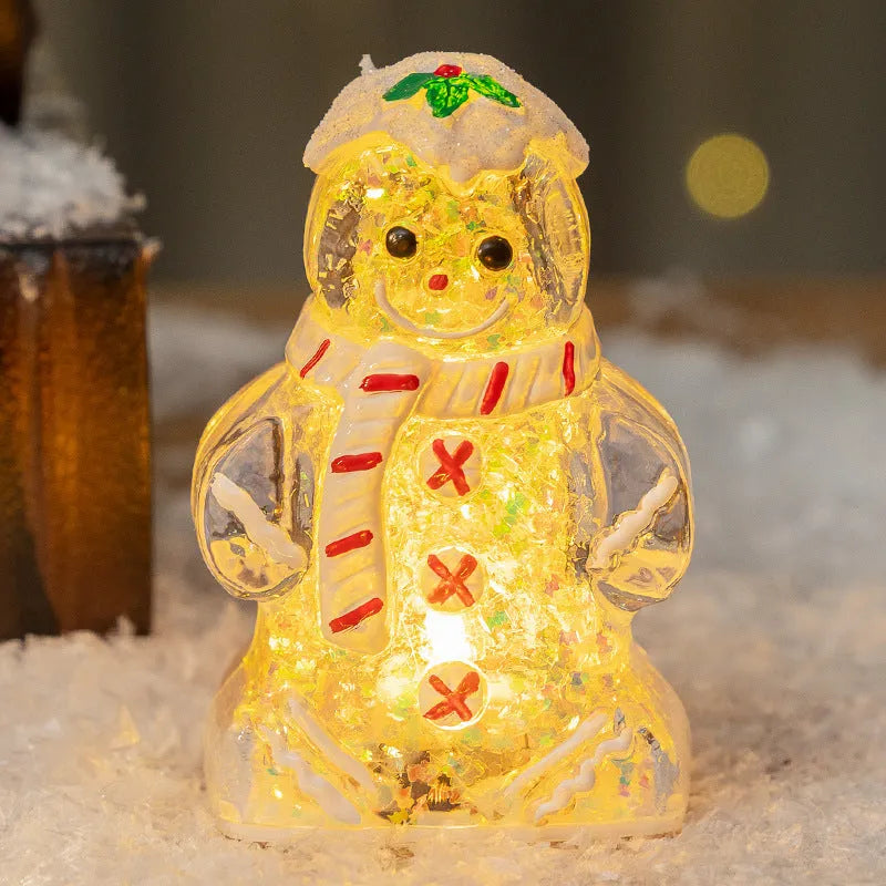 Glowing gingerbread man Christmas ornament with snowman design in plastic construction