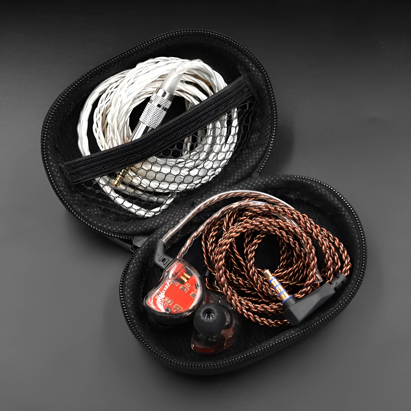 Black oval leather earphone storage case for EDX PRO and compatible models.