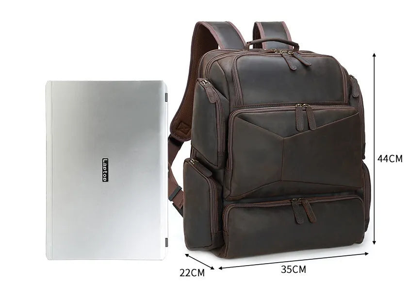 Dark brown retro crazy horse leather backpack for a 17-inch laptop, showing double shoulder straps and external pockets.