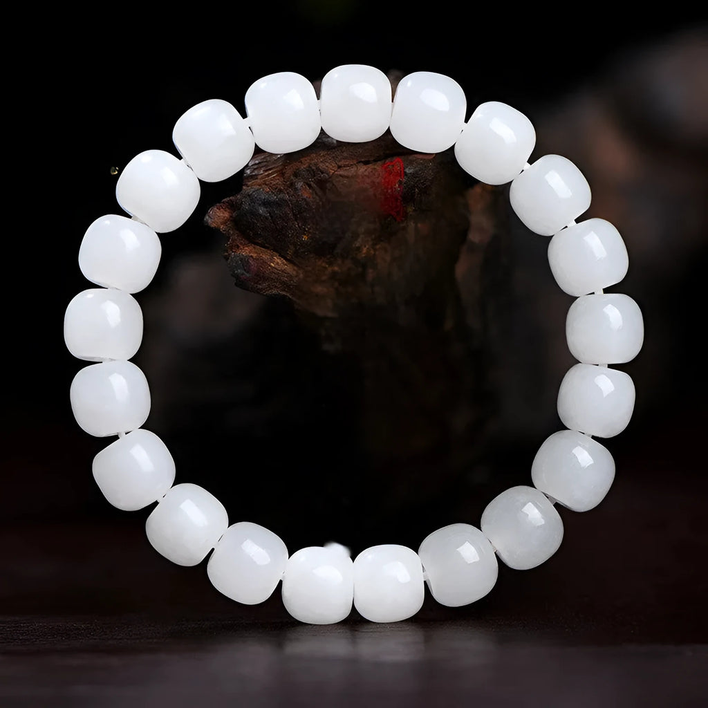 White jade barrel beads bracelet on wrist showing Hetian jade beads in casual unisex design
