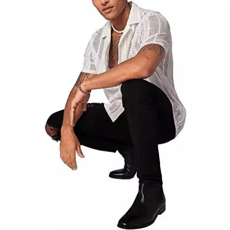Man wearing a white knitted short-sleeved button-down shirt with a cardigan style front.