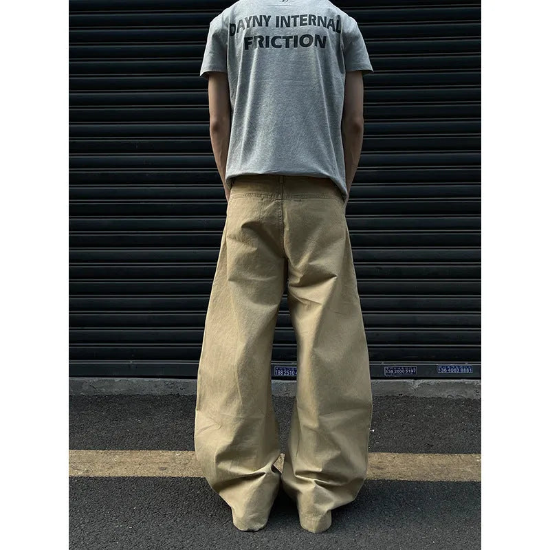 Men's khaki cotton straight-leg trousers with American retro styling laid flat