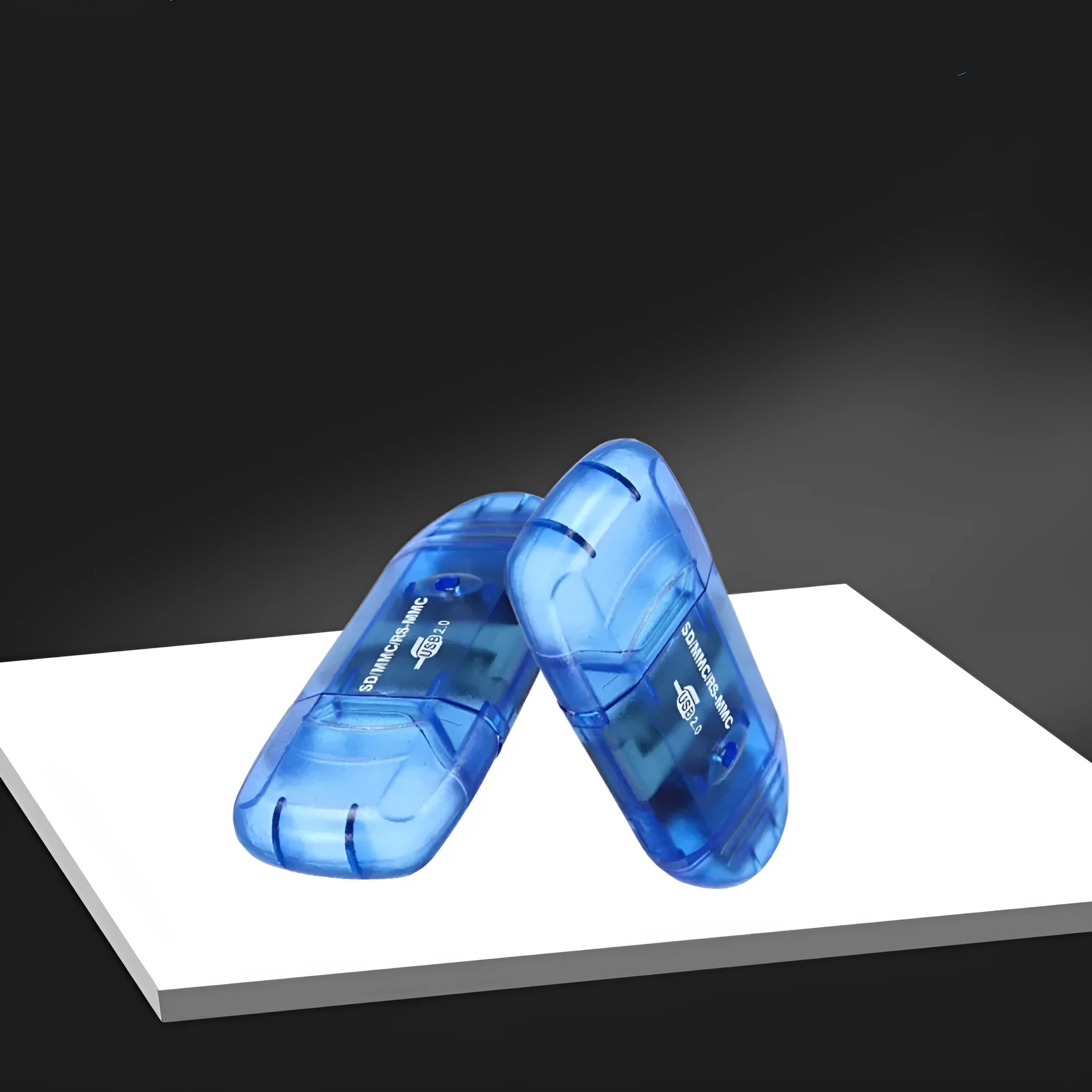 Creative transparent plastic USB card reader with LED light option on a desk