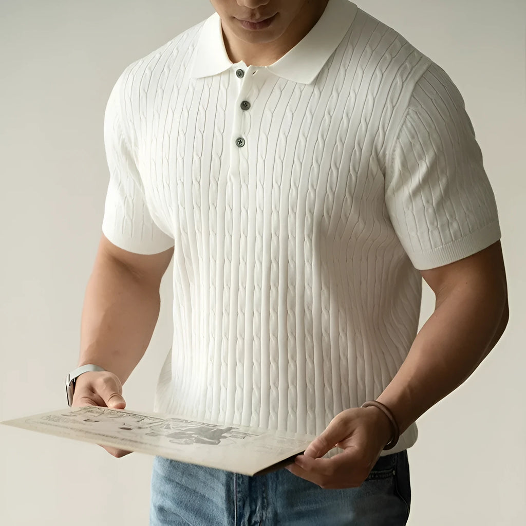 Men's khaki short sleeve business top on a hanger.