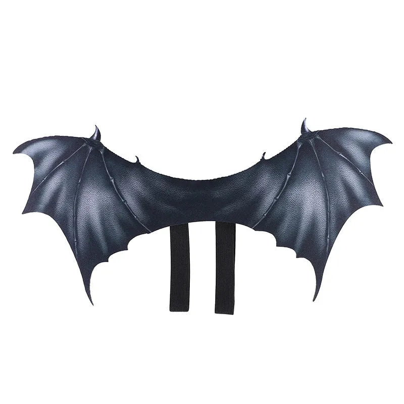 Black cloth bat wings pet costume shown on dog with three size options displayed