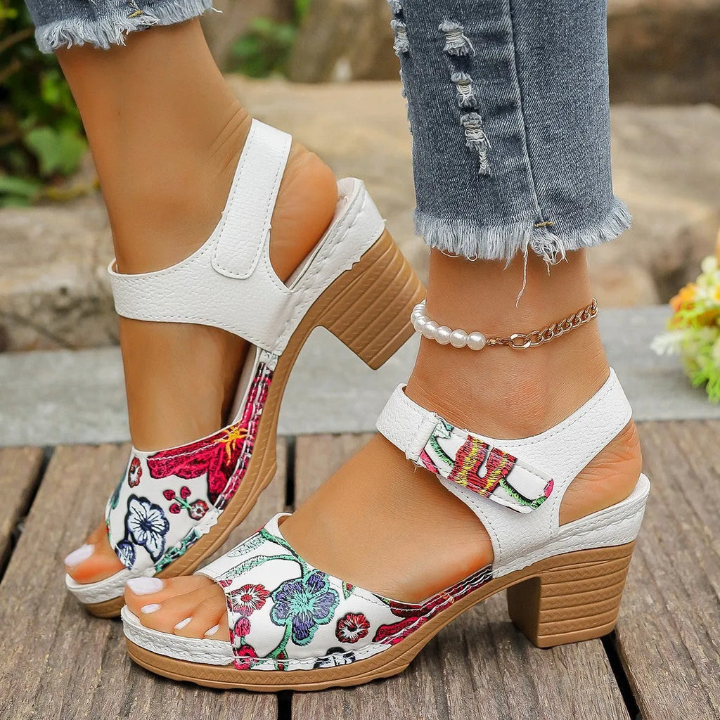 White women's high heel sandals with Velcro buckle closure and rubber sole