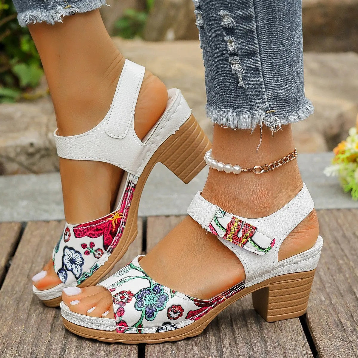 White women's high heel sandals with Velcro buckle closure and rubber sole