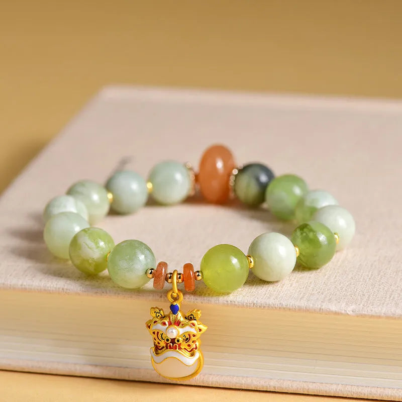 Green milk-in-water Xingshi jade pendant bracelet with 10mm geometric beads on elastic band