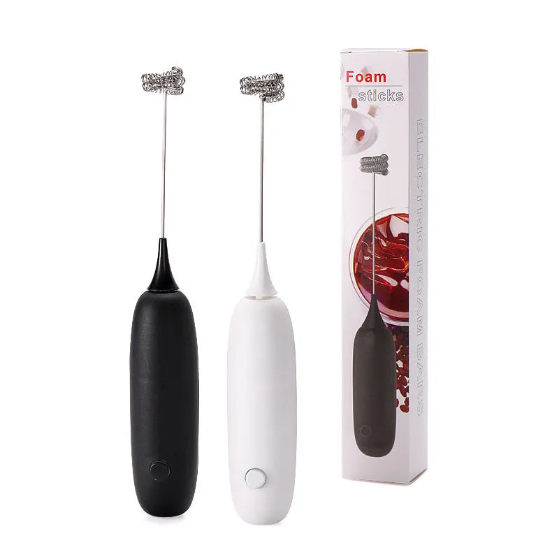 Handheld electric milk frother blender in black and white colours with frothing whisk