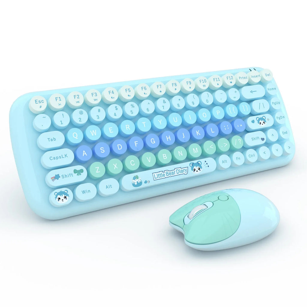 Pink mini cartoon wireless keyboard and mouse set with compact dimensions on desk