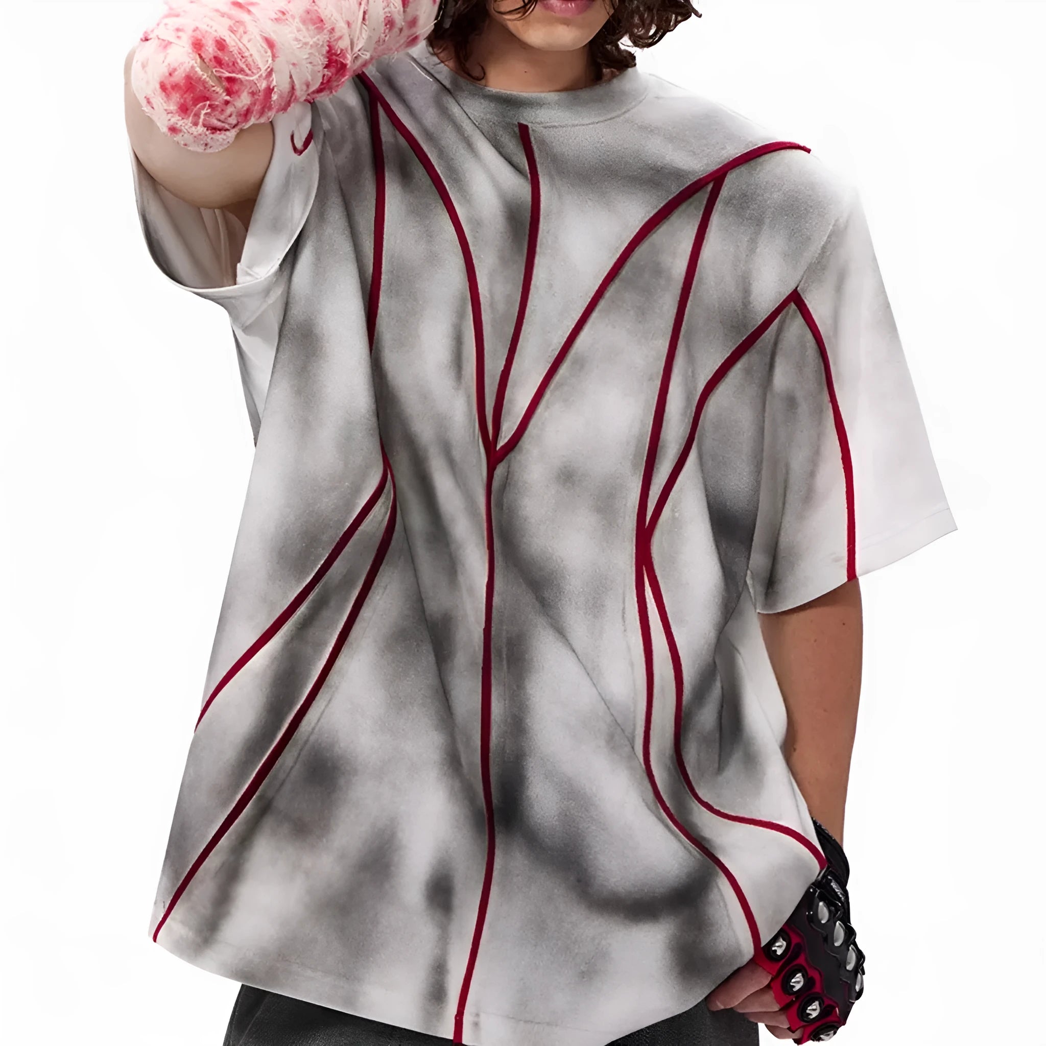 Short sleeve T-shirt with padded shoulders and textured line patchwork on a round neck.