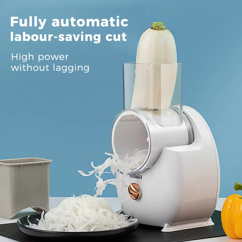 White electric vegetable slicer with suction base and multiple blades for kitchen food preparation