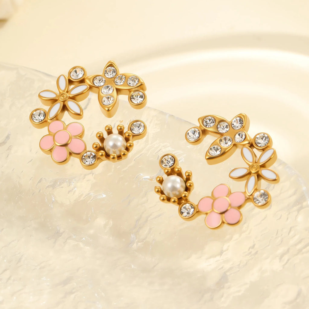 Stainless steel flower stud earrings with colourful oil petals on a white background.