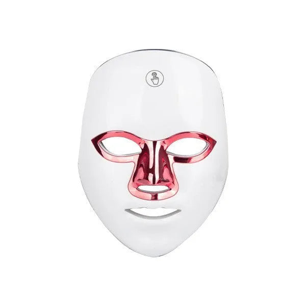 Rechargeable manual touch LED beauty mask in white with gold rim, showing charging cable and strap.