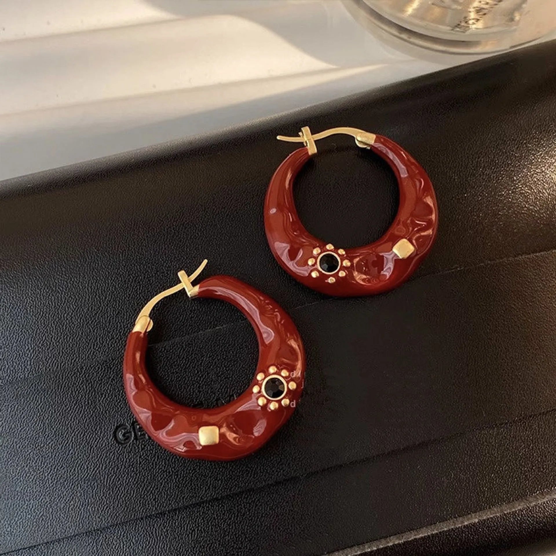 Hong Kong style retro rhinestone ear studs with dripping oil treatment in black and red colour options
