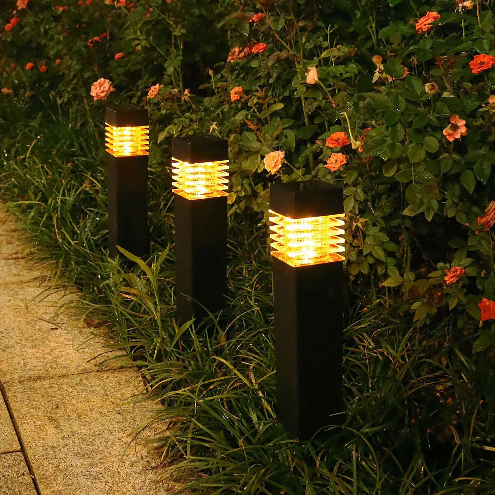 Square solar-powered lawn ground lamp for outdoor garden lighting.