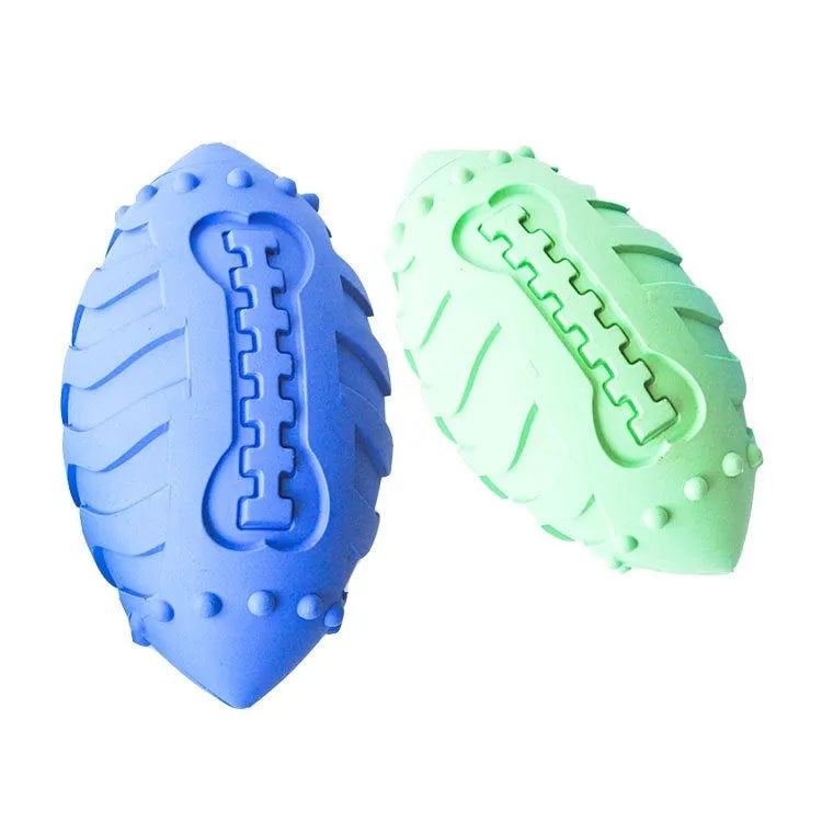 Bite-resistant rubber rugby ball dog toy in light green for teeth cleaning and training