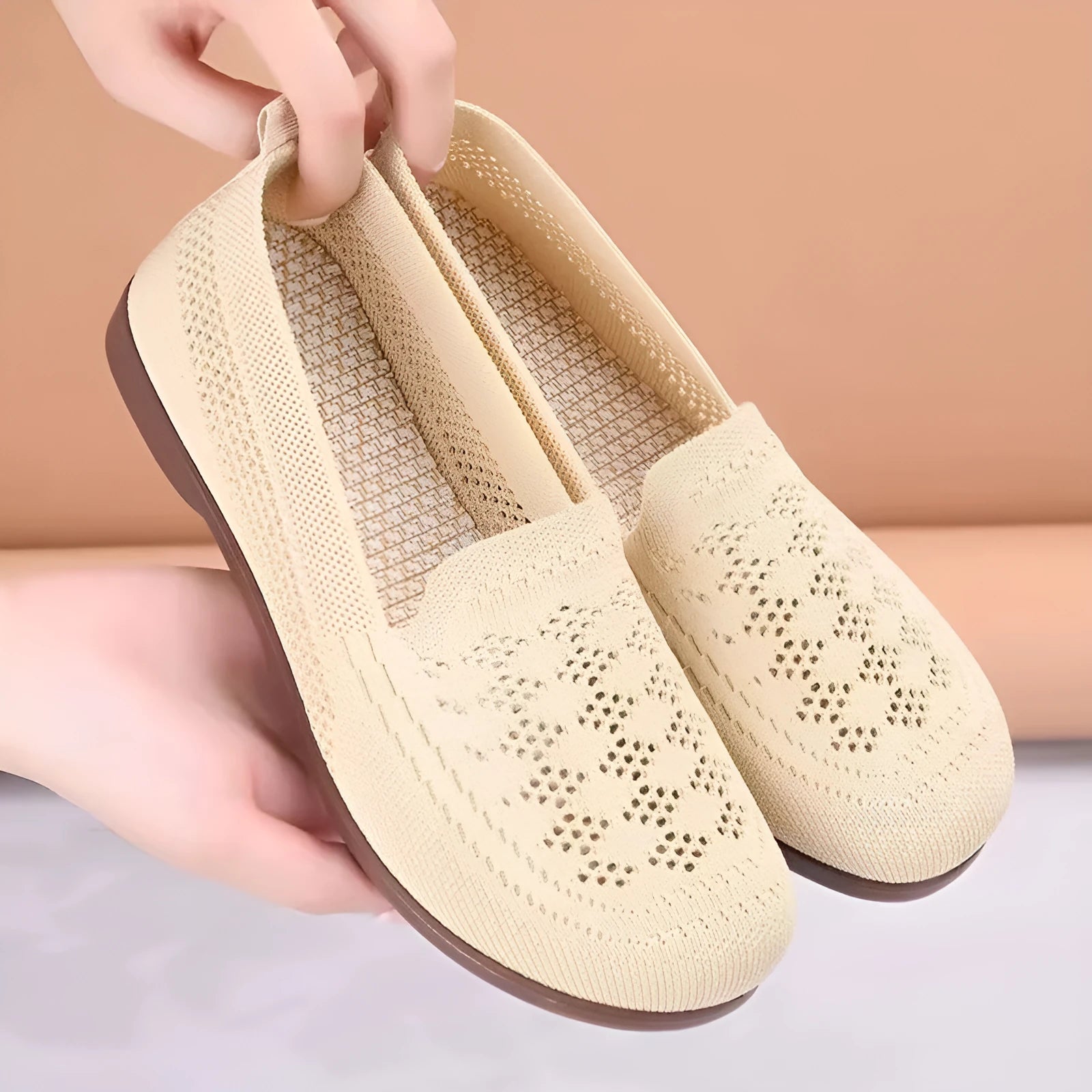 Beige flyknit mesh antiskid trainers for elderly women with wide fit and breathable hollow-out design