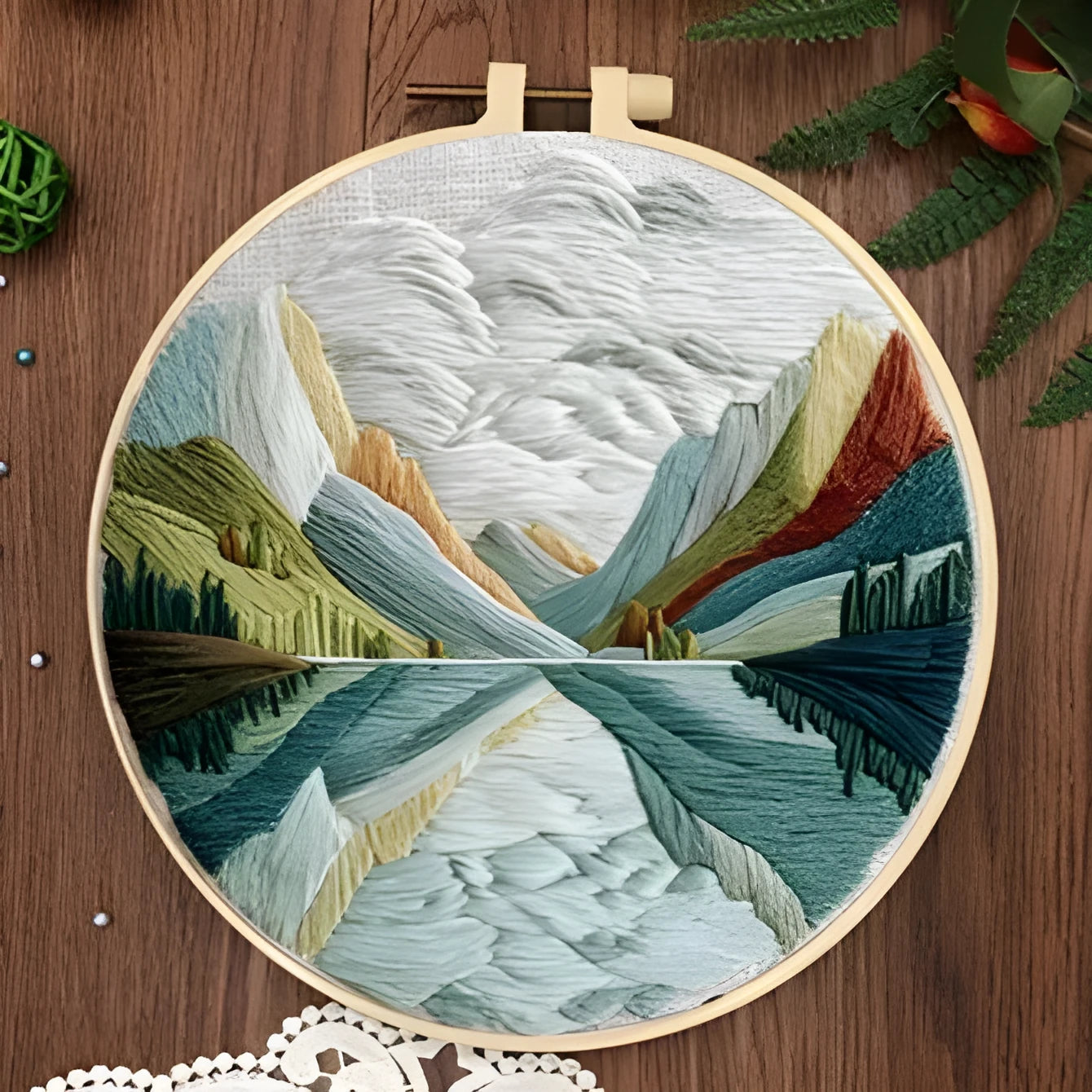 Embroidery DIY landscape kit with cotton fabric, bamboo frame, scissors, and thread for scenic designs