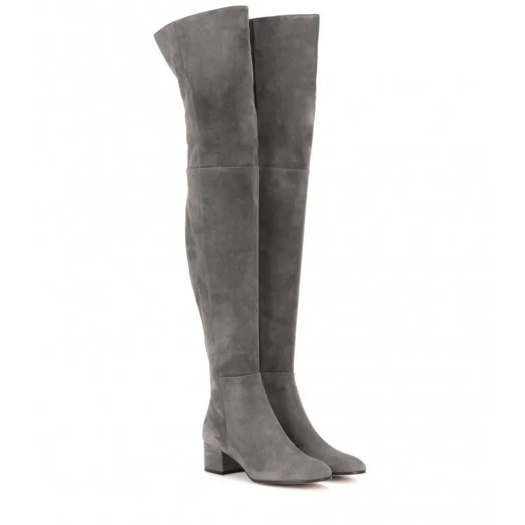 Grey suede women's flat over-the-knee boots with a pointed toe and low thick heel.