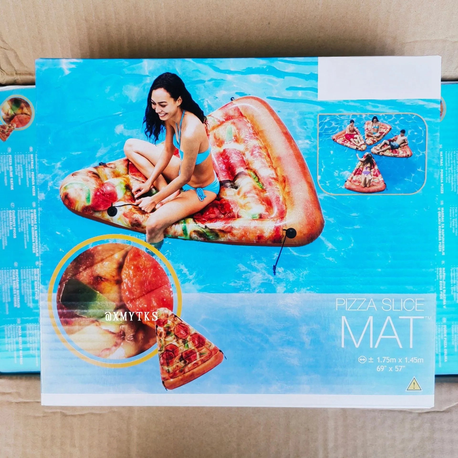 Inflatable pizza float surfboard recliner with vibrant slice design floating on water