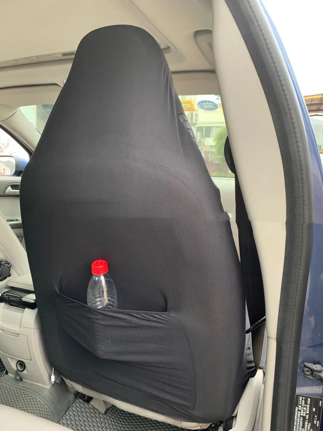Black quilted automotive seat cover with PU and polyester construction for car seat protection