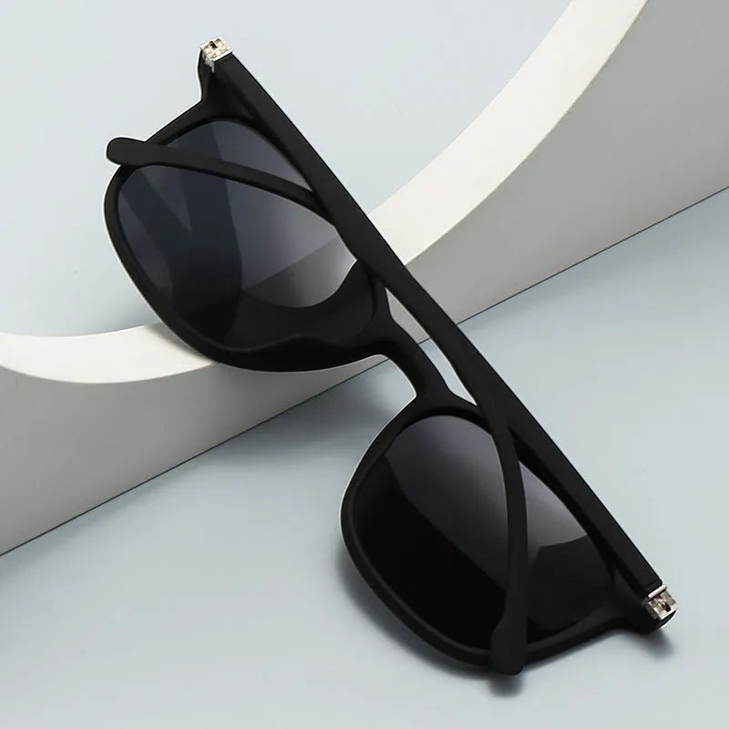 Men's polarised sunglasses with a polycarbonate frame and UV400 protection lenses in assorted colours.