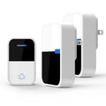 White plastic wireless doorbell with receiver unit showing modern design and compact dimensions