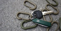 Plastic oval hanging buckle carabiner in POM, 50 by 20mm, shown in army green colour