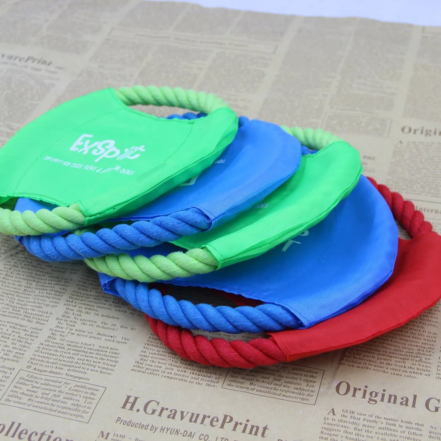 Canvas and rope pet dog flying disc toy with 19cm diameter on grass