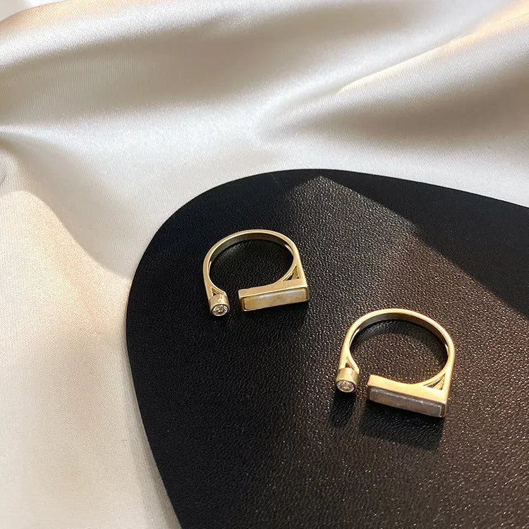 Copper vintage zircon marble ring with electroplated gold finish and adjustable opening, beige colour