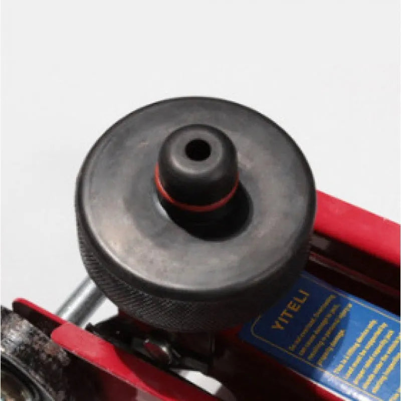 Tesla Model 3 jack pad with rubber ring pattern on chassis lifting point
