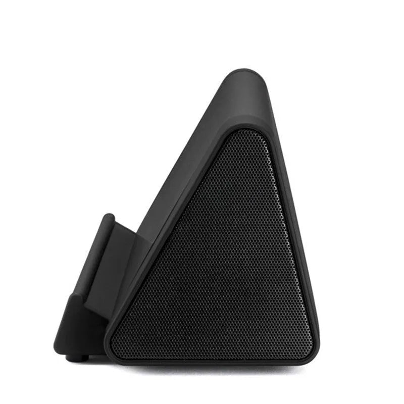 Black and white wireless mini Bluetooth speaker with built-in USB cable for mobile phones and laptops