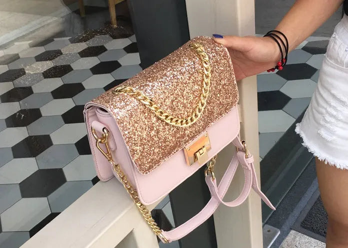 Women's small square sequined PU handbag with lock closure and adjustable shoulder strap in pink, wathet, and black colours 22x16x9cm
