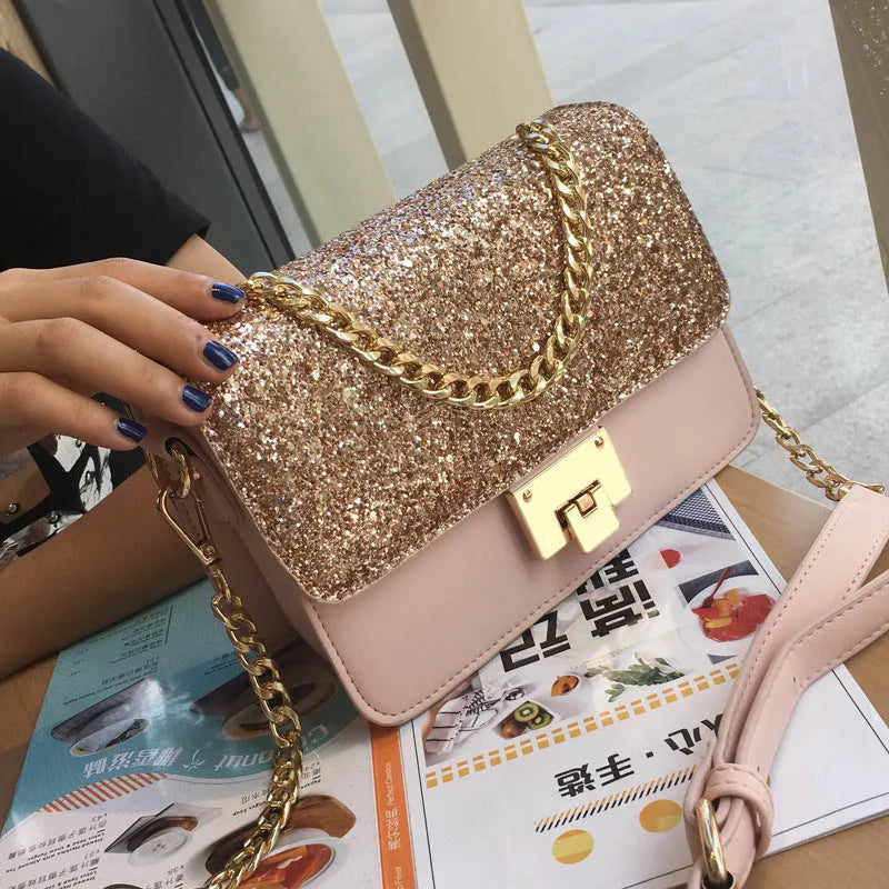 Women's small square sequined PU handbag with lock closure and adjustable shoulder strap in pink, wathet, and black colours 22x16x9cm